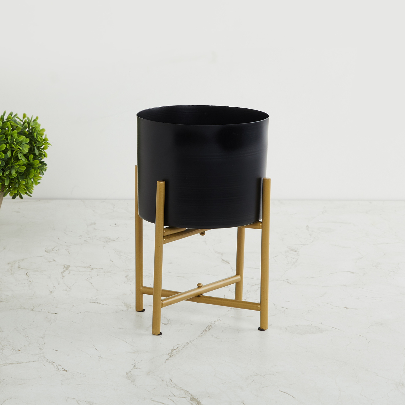 Black Planter on Gold Geometric Stand