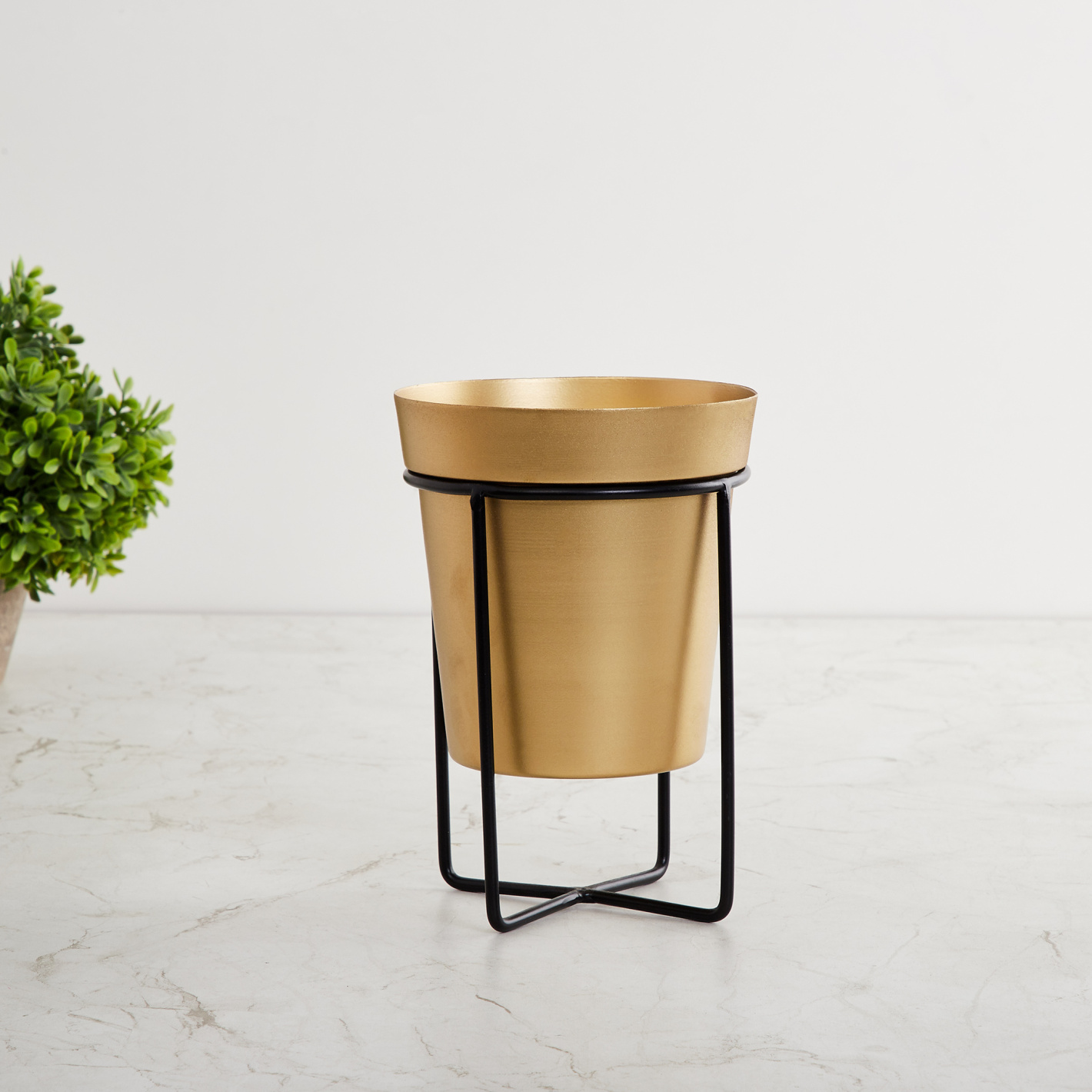 Gold Planter on Black Metal Stand